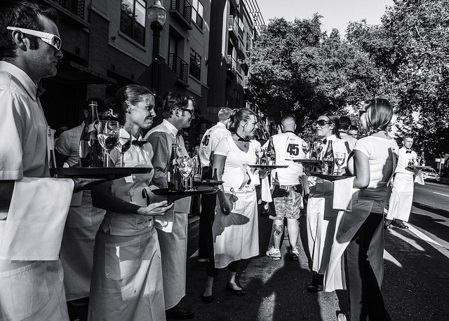 Waiters, waitresses and servers at event - Black and white photo