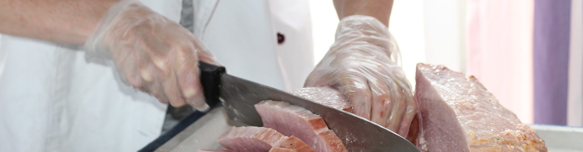 Chef cutting meat